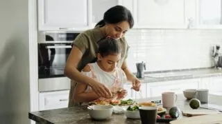 mother-and-daughter-preparing-avocado-toast-4259707-3